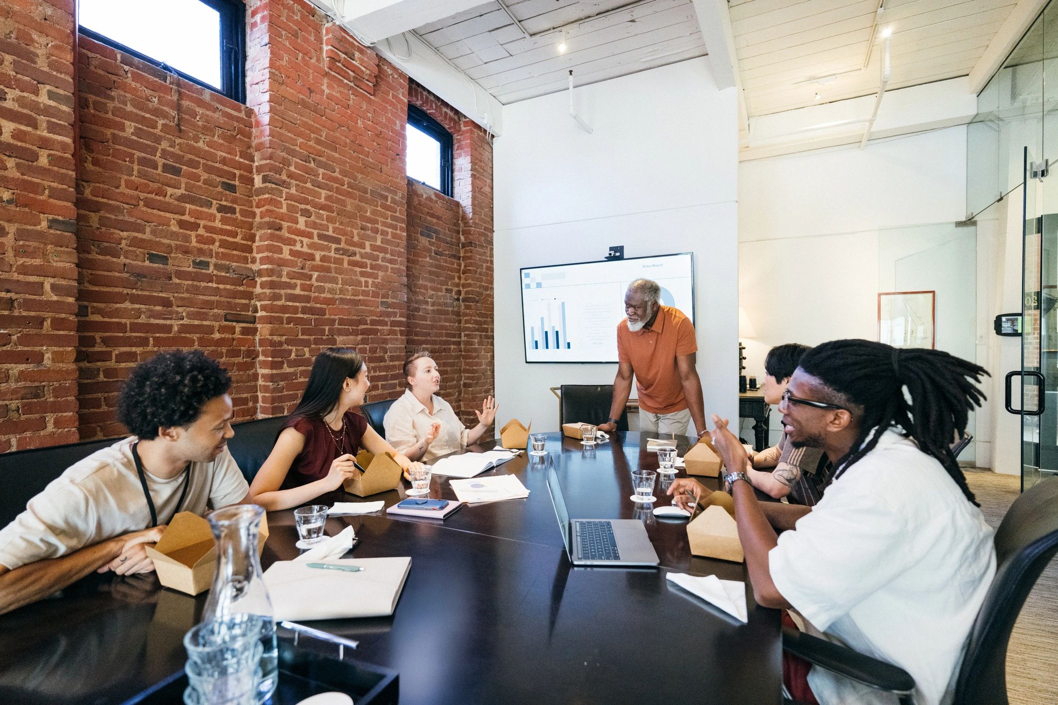 Consulting team collaborating in a boardroom